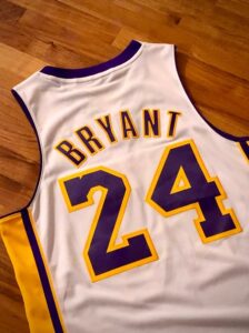 LA Lakers shirt showing Koebe Bryant's name and the number 24 