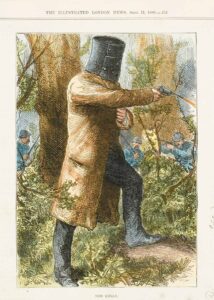 Ned Kelly dressed in his famous armour emerging from the bush with his guns drawn.